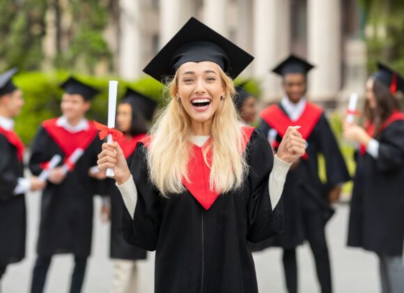 Emotional blonde lady student having graduation party